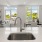 Spacious living area with large windows overlooking East Boston.