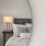 View of the bedroom reflecting in the mirror
